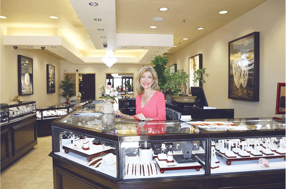 Woman Smiling at Jewelry Counter